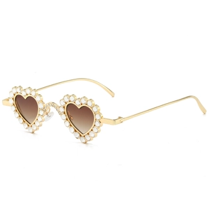 Modern heart-shaped sunglasses with gold metal frame and rhinestones for women