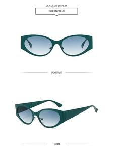 Detail of retro oval cat eye sunglasses with green frame and blue gradient lenses