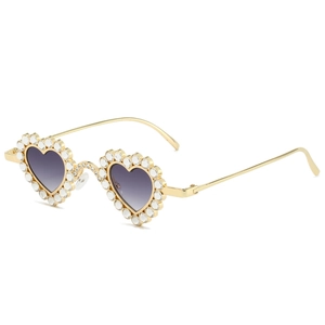 Modern gold heart-shaped sunglasses with sparkling rhinestones and gradient purple lenses