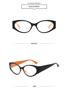 Detail view of retro cat-eye sunglasses featuring matte black frames with orange inner layer