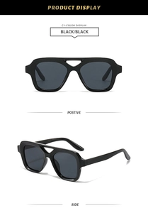 Detail view of retro double bridge square sunglasses showing black frame and side profile