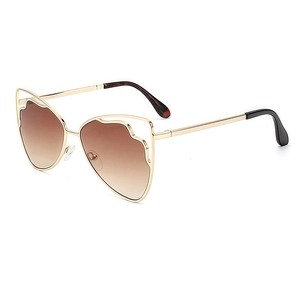 Lunettes soleil papillon pour femmes avec monture dorée ondulée et verres dégradés bruns