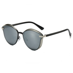 Lunettes de soleil œil de chat rétro avec monture métal et verres gris foncés