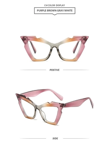 Detailed view of oversized cat-eye sunglasses with purple and brown gradient frame