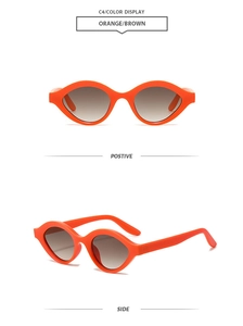 Detail view of orange oval sunglasses with brown gradient lenses from front and side angles