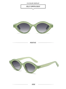 Detail view of oval jelly green cat eye sunglasses with gray gradient lenses