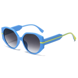 Fashion oversized polygonal sunglasses in bright blue frame with grey gradient lenses