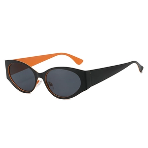 Retro oval cat-eye sunglasses with contrasting matte black and vibrant orange frames