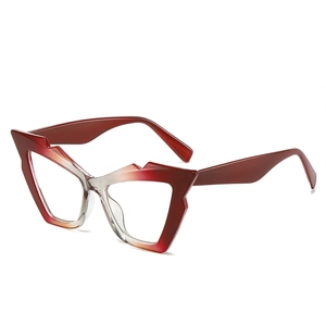 Modern geometric cat-eye sunglasses with red to clear ombre frames and UV protection