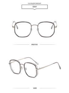 Detailansicht der transparenten grauen quadratischen Brille mit Metallbügeln