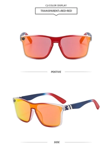 Detail of vintage punk sunglasses with red mirrored lenses and star pattern frames