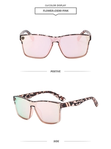Close-up of leopard and pink frame sunglasses with light pink lenses and gold temple detail