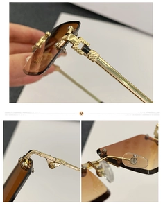 Detail of gold metal hinges and gradient brown rimless lenses on square sunglasses