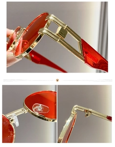 Detail of red lenses with gold hollow metal hinges and silicone nose pads for sunglasses