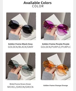 Detail view of oval metal sunglasses in grey, purple, green, and orange gradient lenses
