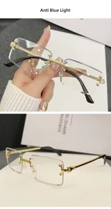 Detail of rimless anti-blue light glasses with gold metal frame and engraved bridge