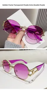 Detailed macro view showing the oval gold metal frame and purple gradient lenses on sunglasses