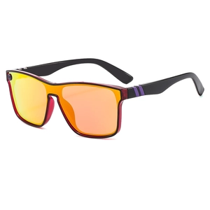 Retro punk one-piece sports sunglasses with translucent red frames and orange mirror lenses