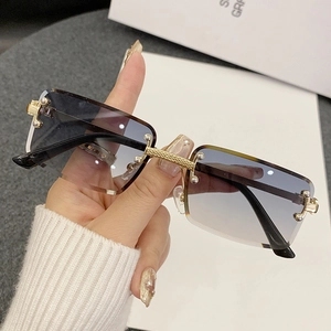 Classic rimless rectangular sunglasses with gold metal frame and gradient lenses