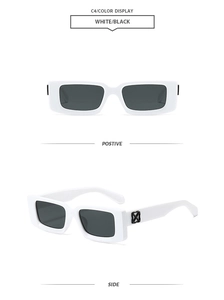 Detail of square white sunglasses featuring dark lenses and black cross arrow logo arm