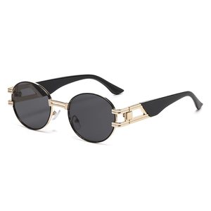 Retro steampunk oval sunglasses with gold hollow metal frame and dark gray round lenses