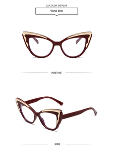 Detail der weinroten Cat-Eye-Brille mit eleganten Goldakzenten und klaren Gläsern