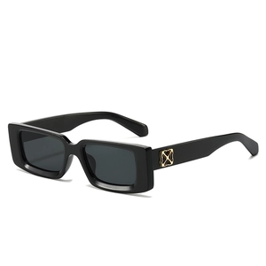 Classic black rectangular sunglasses with golden metal hinge detail on white background