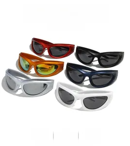 Close-up of sporty Y2K sunglasses in various colors including orange and silver