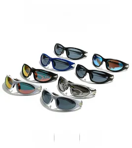 Close-up of futuristic punk style sunglasses featuring star decor and wraparound design
