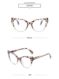Detail view of leopard print cat eye glasses frames with clear lower rims and polished finish