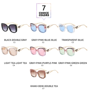 Detailed grid of seven oversized square sunglasses showing assorted gradient colors and gold temples