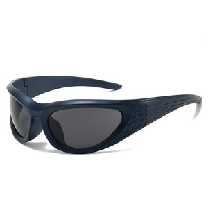 Futuristic matte blue wraparound sports sunglasses with aerodynamic Y2K design and grey lenses