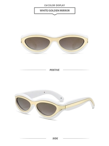 Detail of white cat-eye frames with golden mirror lenses and side metal accents