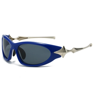 Punk style blue futuristic sunglasses with silver star spikes and grey lenses