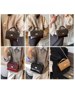 Quilted crossbody bag with gold lock shown in various colors on models for styling