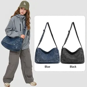 Vintage denim messenger bag in blue and black with adjustable wide shoulder straps