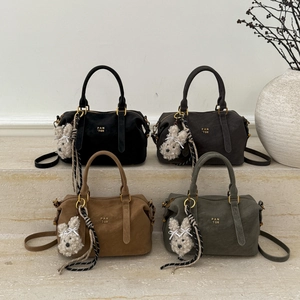Minimalist matte shoulder bags in black, gray, camel, and green with rabbit charms