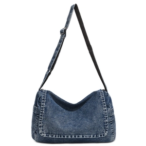 Blue washed denim crossbody bag with adjustable strap and casual messenger design