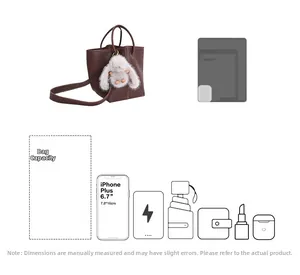 Detail showing high capacity of dark brown leather bucket bag for phone and umbrella