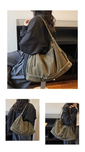 Detail view of large olive green suede tote bag with metal buckle strap and soft texture