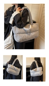Detail view of the soft quilted texture and padded handle on this gray puffer tote bag