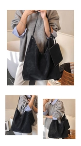 Détails du sac cabas en suédine noire avec surpiqûres et petite pochette assortie