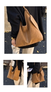 Sac cabas en daim marron avec surpiqûres blanches et bandoulière à nœuds