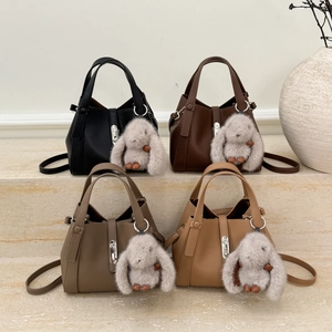 Chic bucket tote set in four colors with plush rabbit charms and adjustable straps