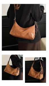 Dettagli della borsa hobo in pelle scamosciata marrone con angoli rinforzati in pelle