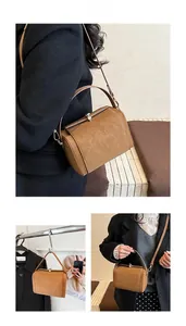 Vue détaillée du sac docteur vintage marron avec fermoir métallique et texture cuir