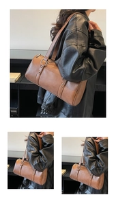 Detail of vintage brown cylinder shoulder bag with leather texture and rivet accents