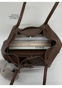 Brown lychee leather tote interior view with zipper pocket and large capacity for books