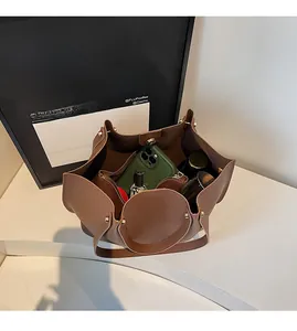 Top view of spacious brown lychee texture tote bag showing interior storage capacity