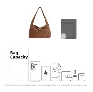 Capacity detail of vintage brown shoulder bag showing space for iPad and essentials